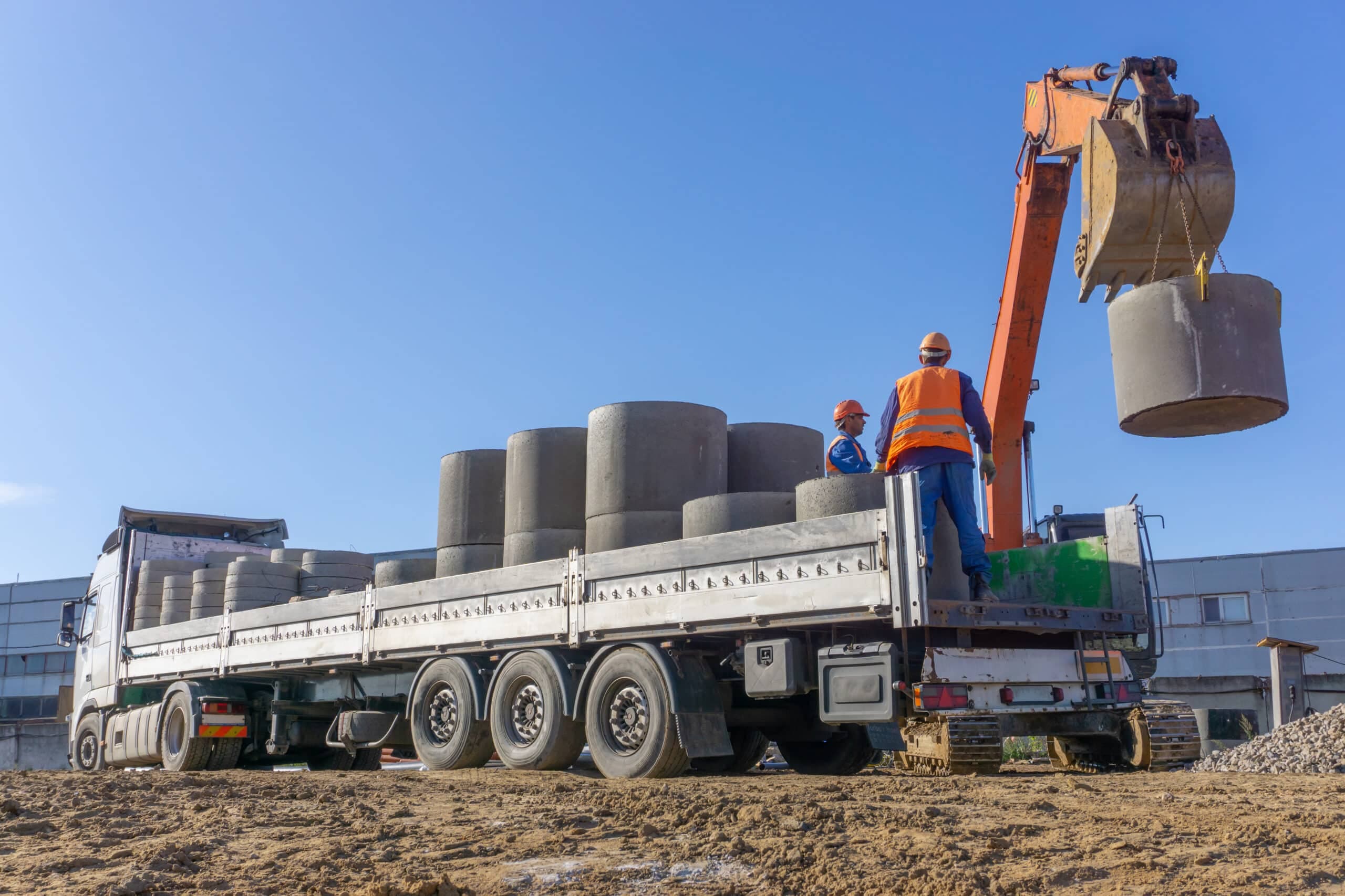 Delivery,And,Unloading,Of,Construction,Materials,By,The,Excavator,To